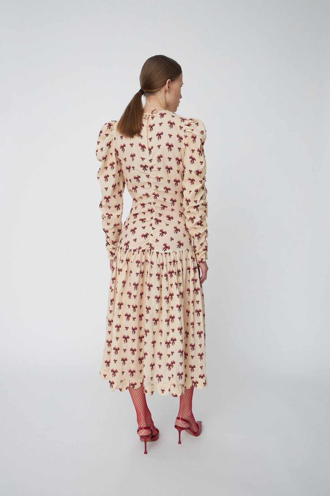 Midi Dress with allover Bow Print